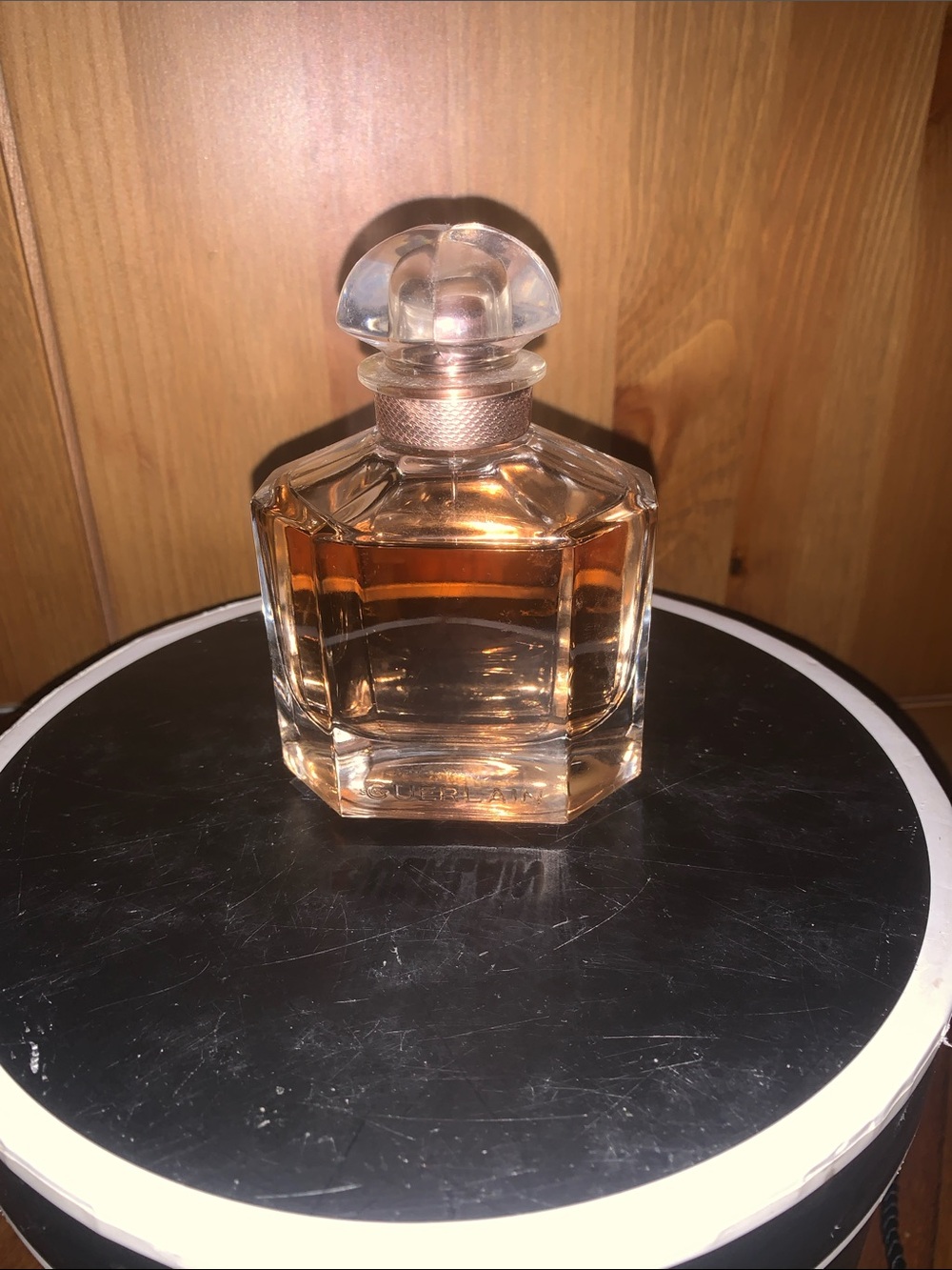 GUERLAIN Clear Glass Perfume Bottle with Amber Liquid